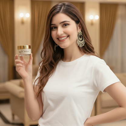 Woman holding a skincare product Gluta White